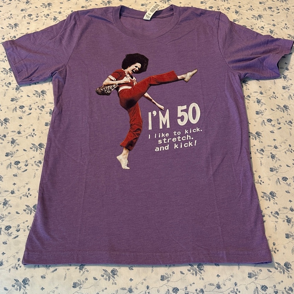 Sally O’Malley 50th Birthday Purple Kick Graphic Tee
